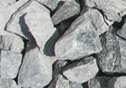 A sample of our inch-and-a-half crushed granite gray stone.