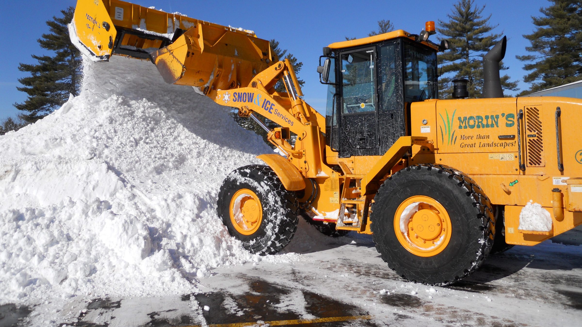 Clear Pic loader moving snow